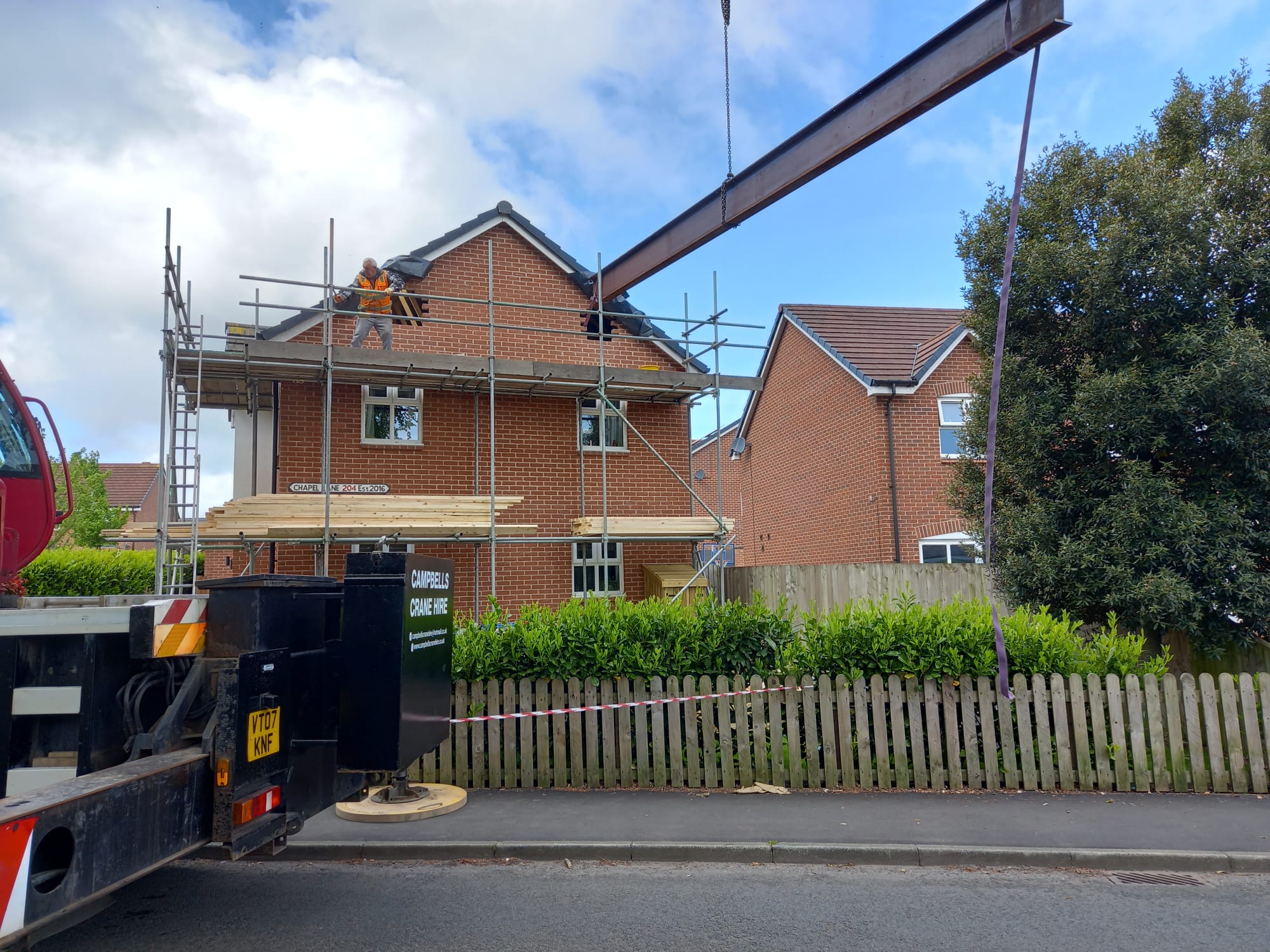 A loft conversion underway in north west uk england with steel beams being installed and built by topflite loft conversions