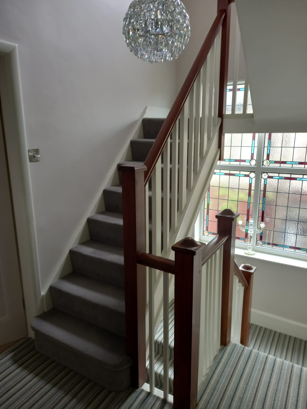 A new staircase to a loft conversion bedroom insulation installation built by topflite loft conversions in northwest england